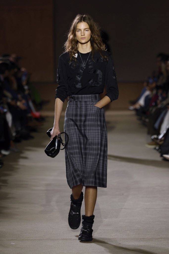 Model on the runway at the Coach fashion show in New York, Fall Winter 2026 Ready To Wear Fashion Week, Runway Look #006